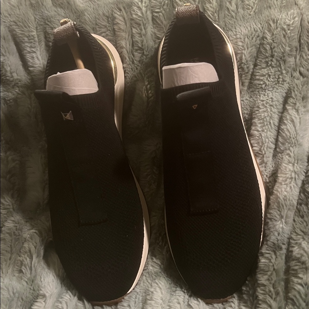 MICHAEL MICHAEL KORS
Bodie Studded Mesh Slip-On Trainer Black.